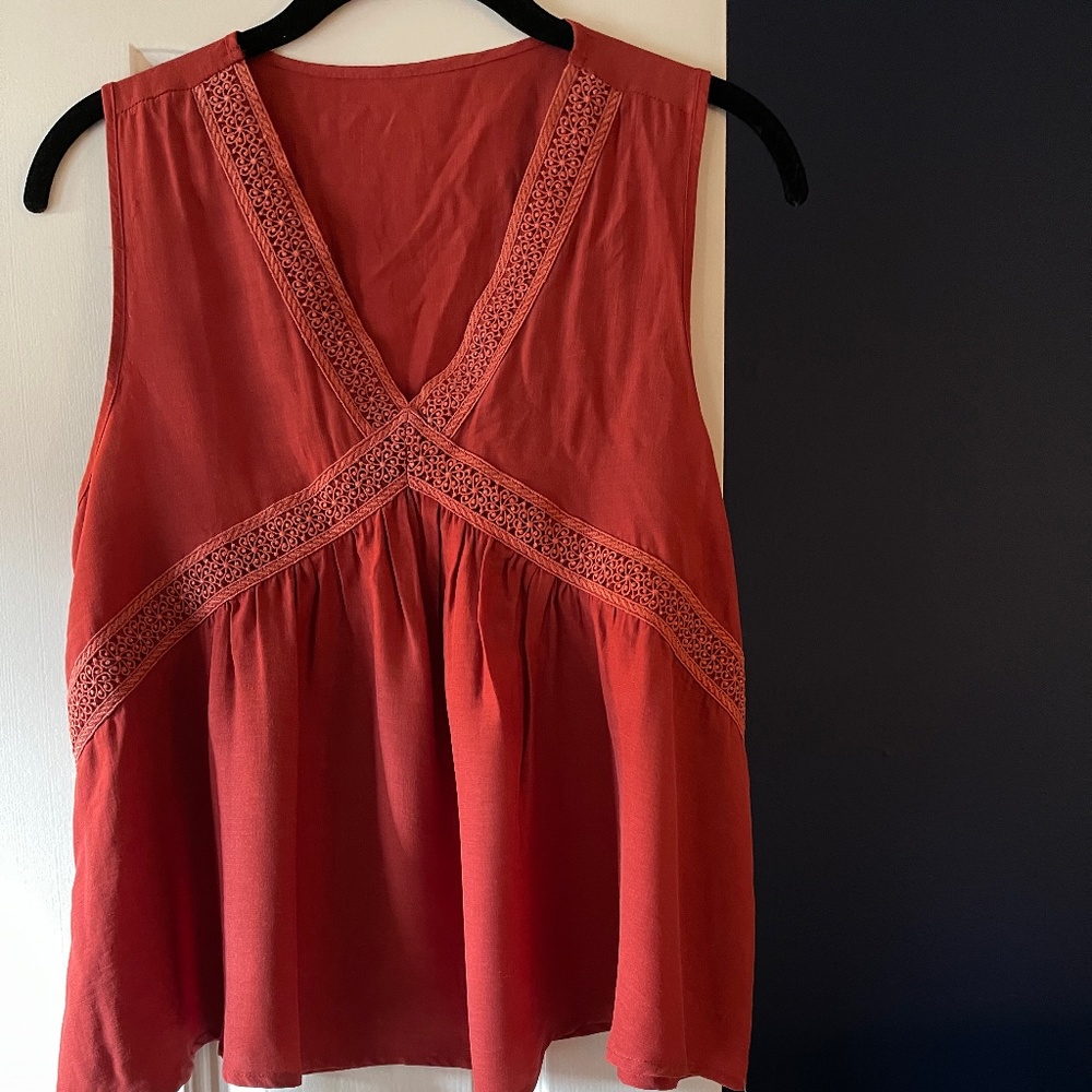 Sleeveless empire waist  embroidered top